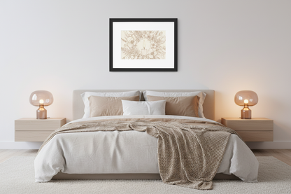 A framed art print with a beige botanical or floral pattern in a black frame, displayed on a light gray wall above a neatly made bed in a modern, minimalist bedroom.