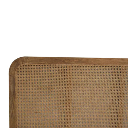 Rattan Bed footboard and side rail detail in warm oak-tone mango wood