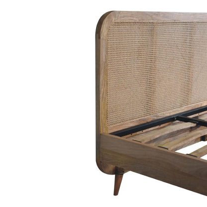Rattan Bed styled in a neutral bedroom with linen bedding