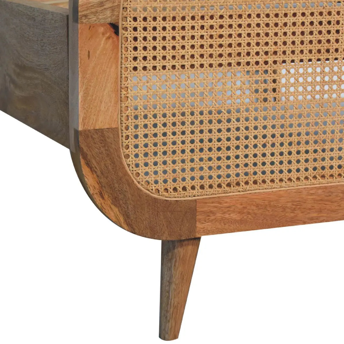 Close detail of the rattan weave and mango wood frame join on the Rattan Bed